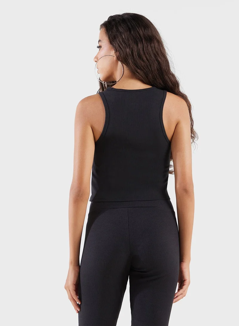 اديداس اوريجينالز بلوزة اسينشال مضلعة بدون أكمام